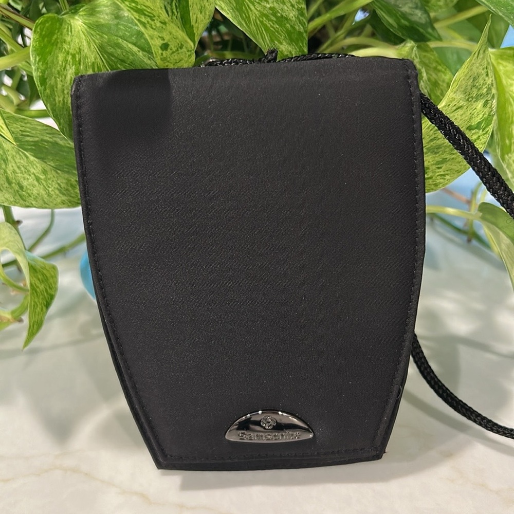 Samsonite Black Crossover Travelers Unisex Crossbody wallet passport holder.